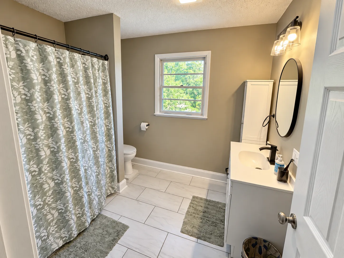 Shared hall bathroom shower